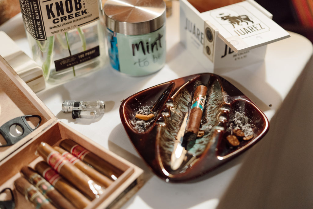 Half-smoked cigar in an ashtray